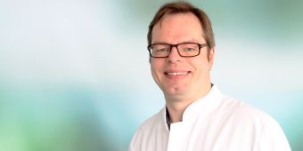 Dr. Niels Reinmuth