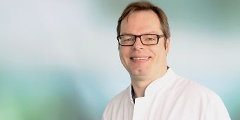 Dr. Niels Reinmuth